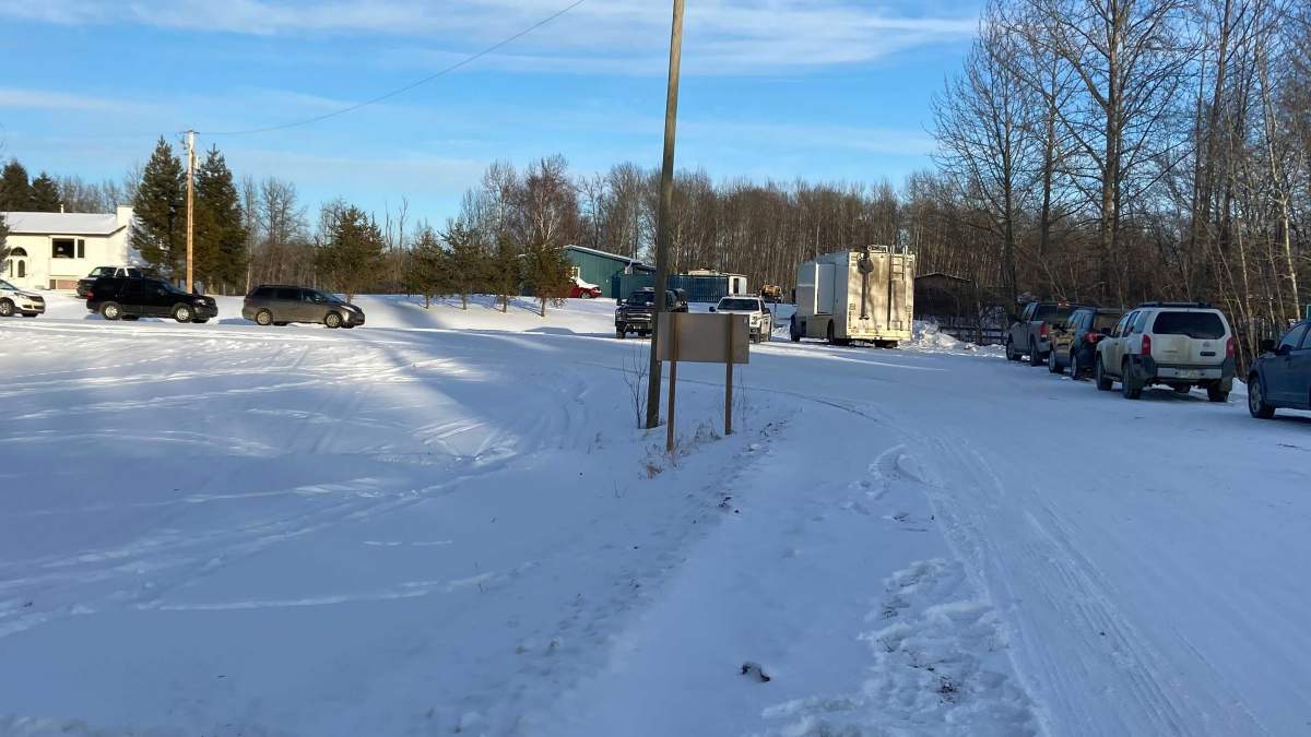 RCMP searching an acreage in the Heatherlea Estates subdivision west of Stony Plain in Parkland County on Feb. 14, 2021.
