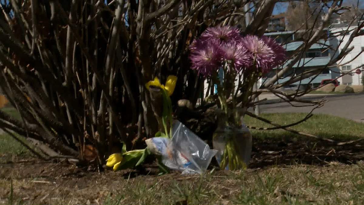 A makeshift memorial is seen at the scene of a fatal pedestrian crash in northeast Calgary.