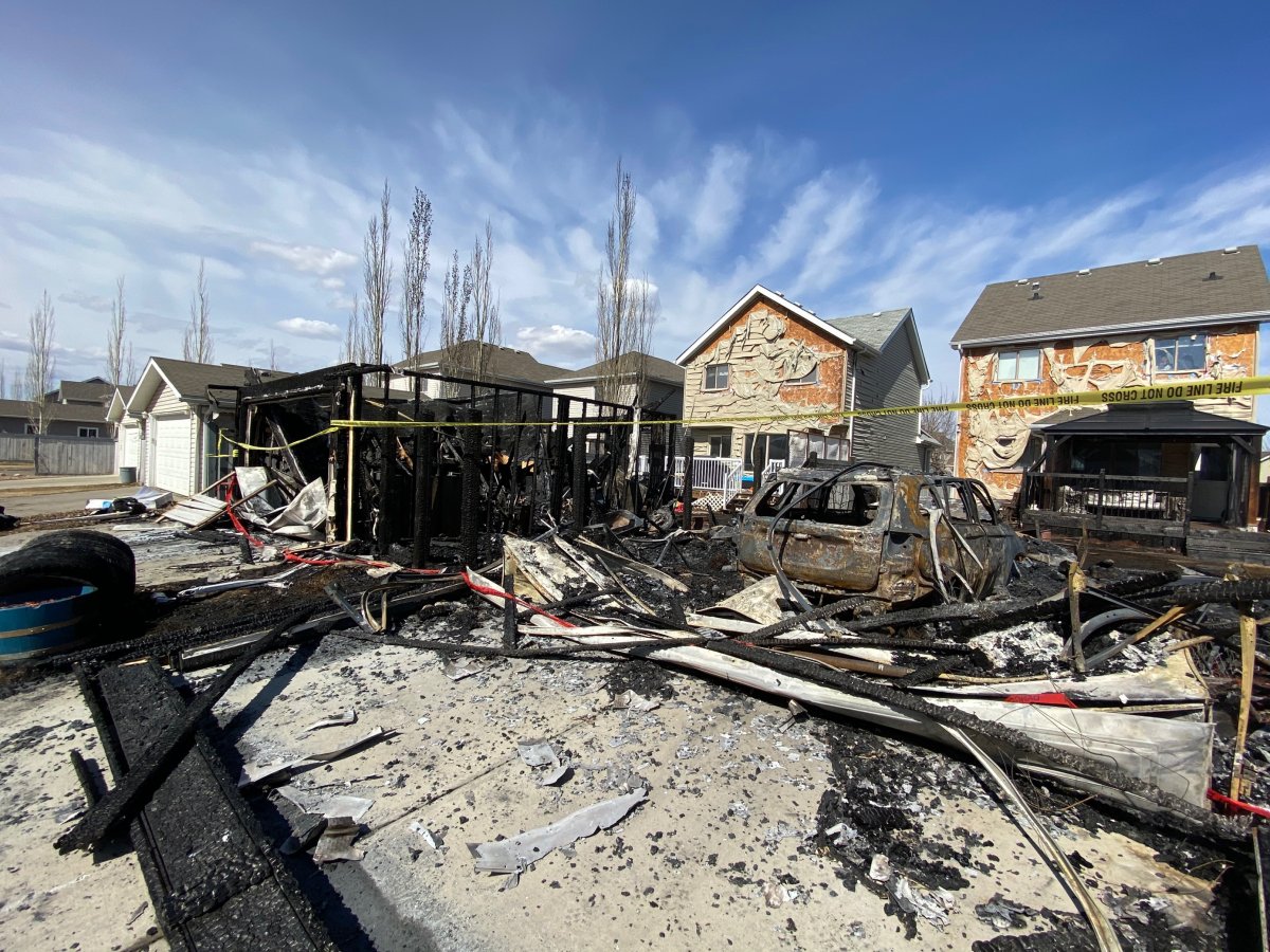 Firefighters responded to an early morning fire at two garages in the area of Stanton Drive and 70 Street SW in Summerside Friday, April 9, 2021.