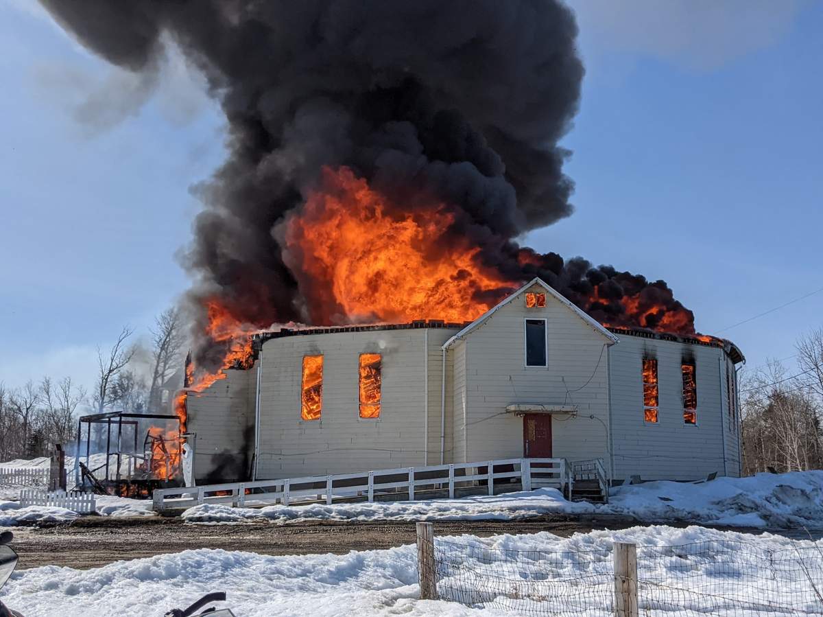St. Theresa Point Roman Catholic Church burns in the Manitoba First Nation Sunday.