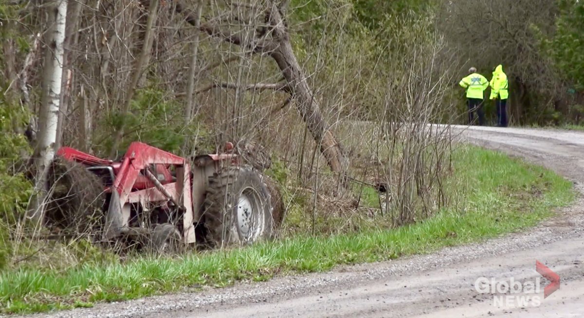 A man died after he was struck by a tree while operating a tractor near Norwood on Friday.