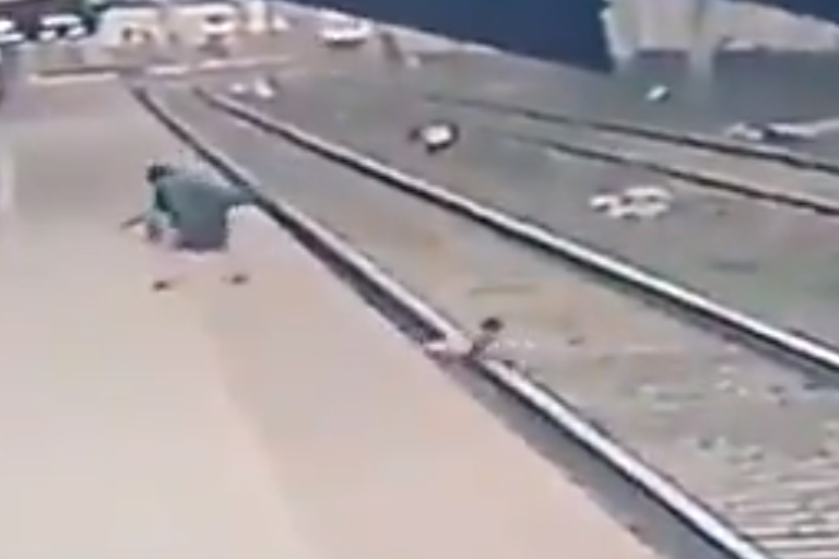 Railway worker rescues child from oncoming train in India - National ...