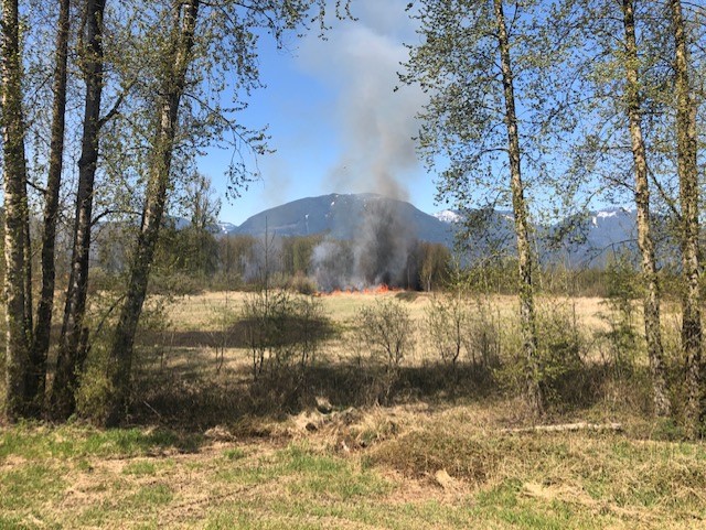 Smoke can be seen coming from the fire Thursday afternoon. Credit: Tony Clark / Global News