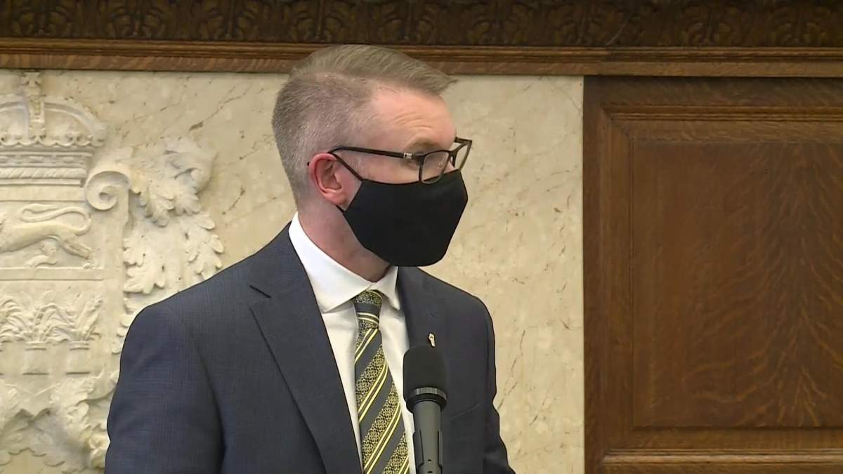 Everett Hindley presents award to the Saskatchewan Canadian Mental Health Association for monitored game that combat cyberbullying and its impact on mental health.