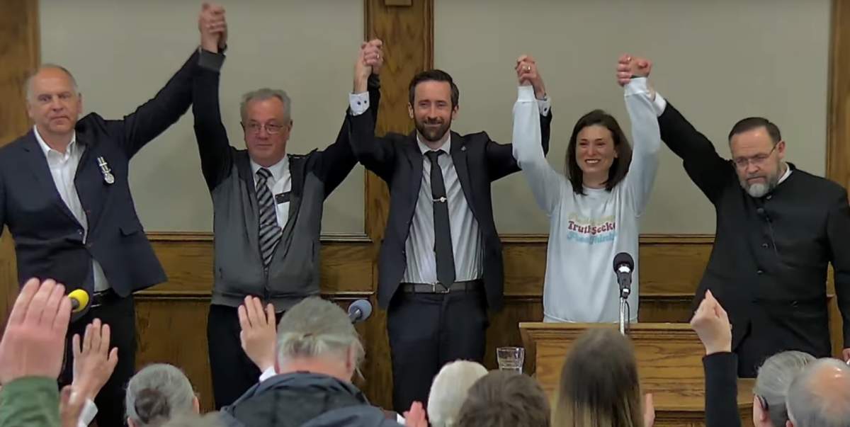 Randy Hillier, second from left; Derek Sloan, third from left; and Henry Hildebrandt, far right at the Church of God in Aylmer, Ont., on April 25, 2021. 
