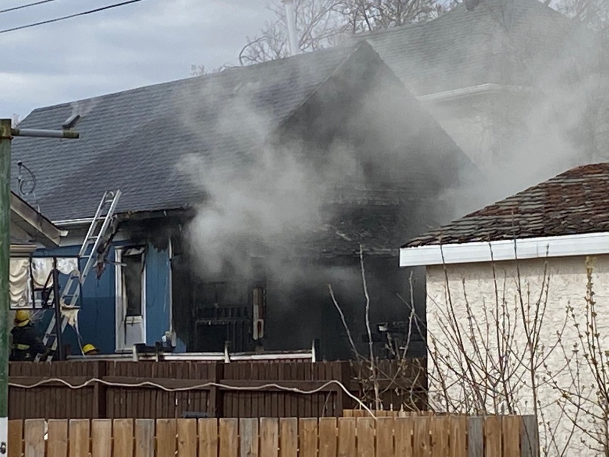 A Church Street house burns Friday morning.
