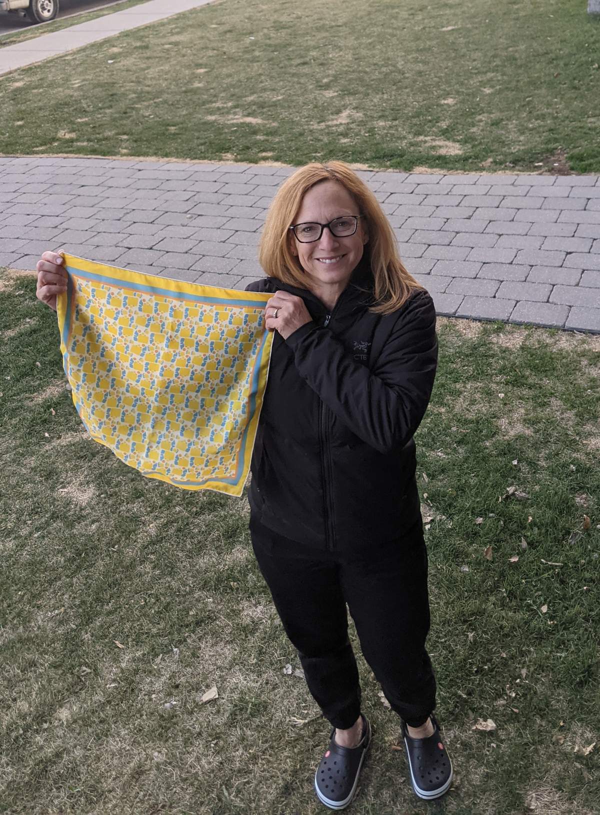 Madi’s mom showing off her gifted scarf.