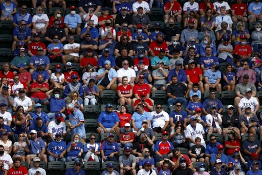 Fans look on as the Texas Rangers take on the Toronto Blue Jays in the fourth inning on Opening Day at Globe Life Field on April 5, 2021, in Arlington, Texas.