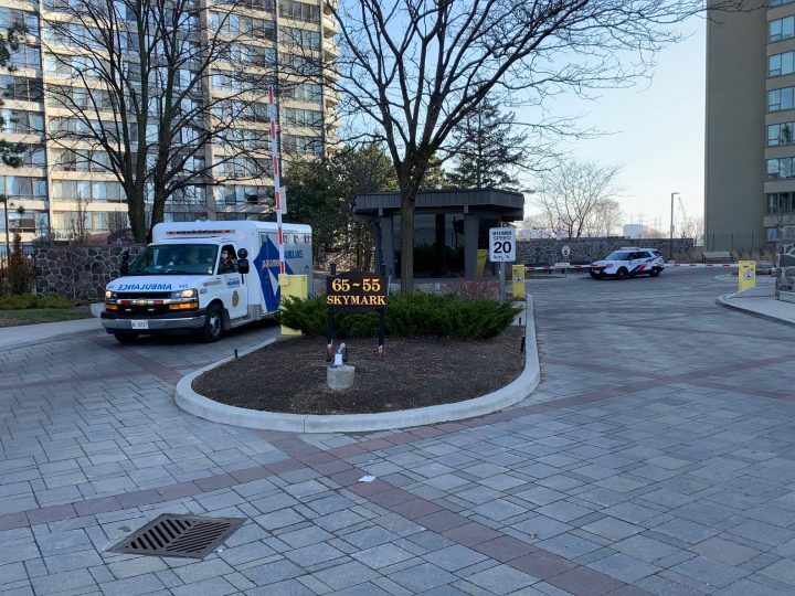 Police and paramedics are seen at the scene of a fatal stabbing in North York on Sunday.