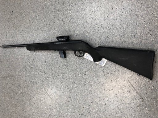 A firearm seized during the arrest.