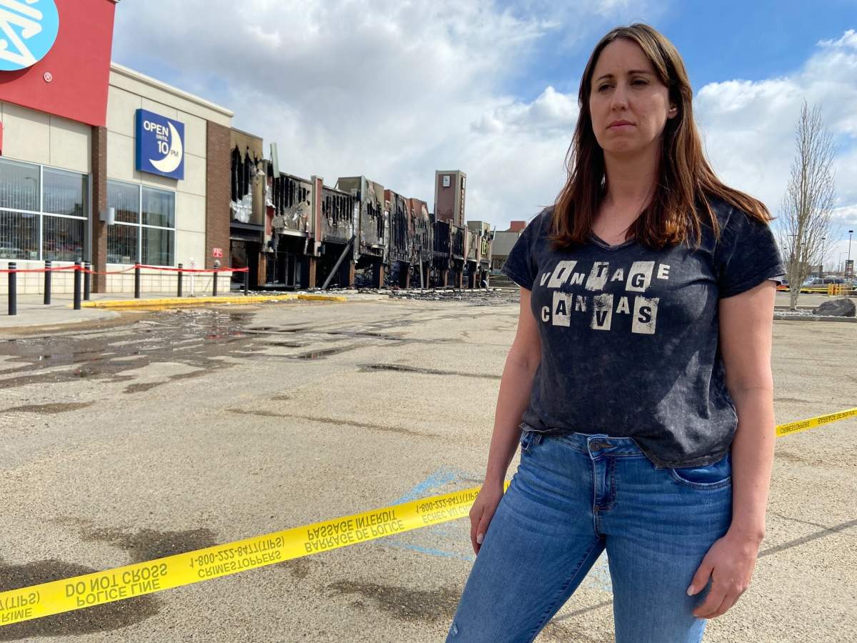 KLee Boutique owner Kristen Lang deals with the devastation of having her store being one of six businesses destroyed in a fire in Sherwood Park, Saturday, April 24, 2021.