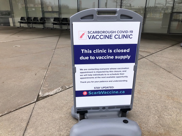 A sign from Scarborough Health Network that reads “This clinic is closed due to vaccine supply.”