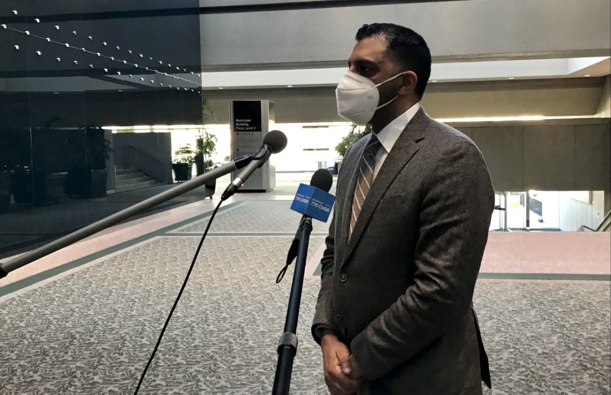 Calgary Councillor George Chahal speaks with reporters after presenting the final report from the Community-Based Public Safety Task Force, pictured on April 14, 2021.
