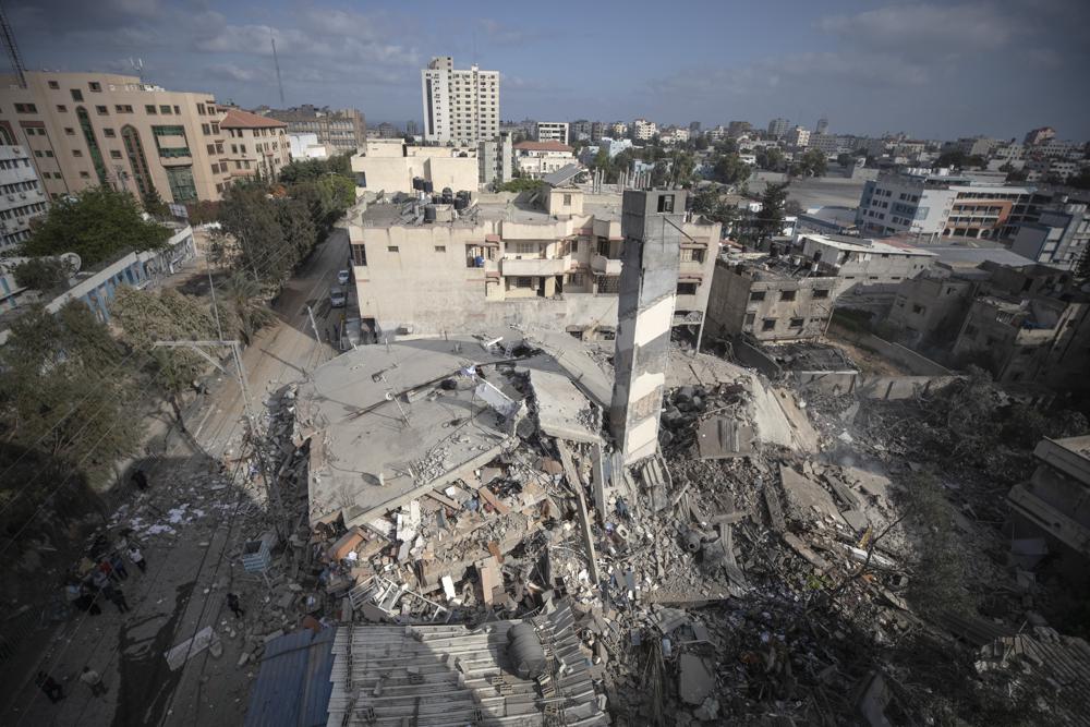 A top view shows the remains of a six-story building which was destroyed by an early morning Israeli airstrike, in Gaza City, Tuesday, May 18, 2021.