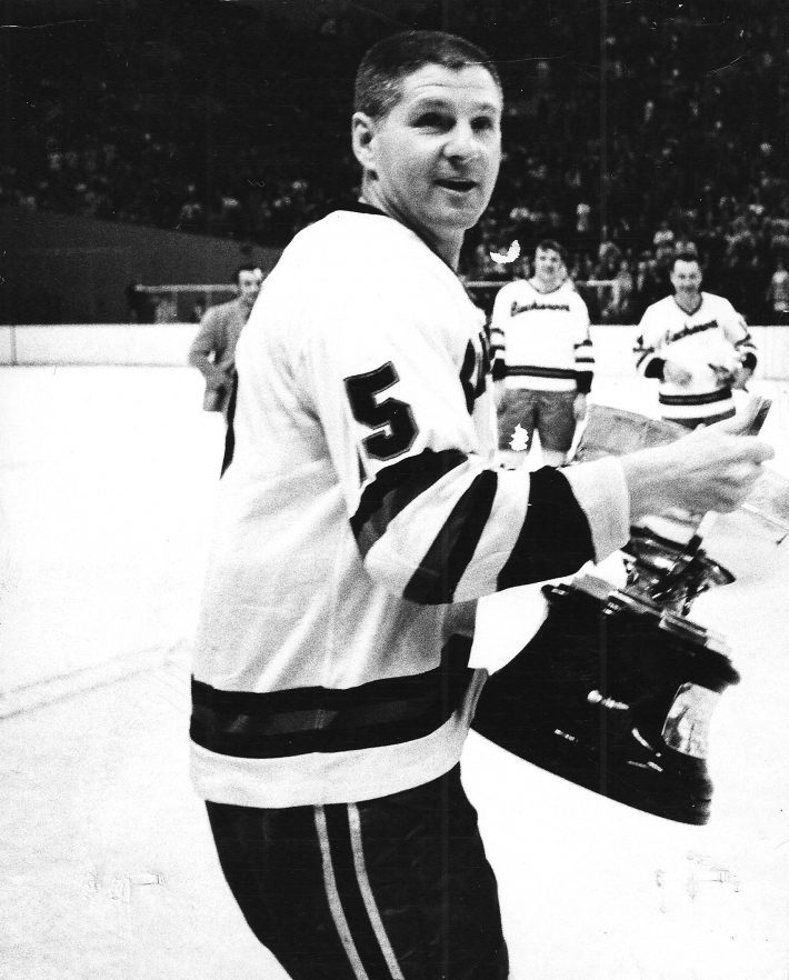 Art Jones holding the Lester Patrick Cup after winning the WHL championship.
