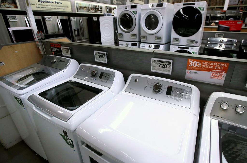 Washer and dryers are displayed at the Home Depot store in Londonderry, N.H. on July 11, 2019. THE CANADIAN PRESS/AP, Charles Krupa.