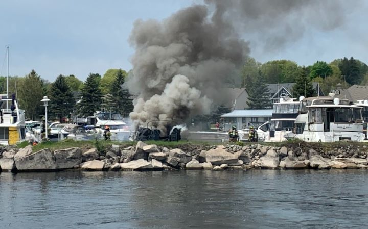 Emergency crews were called to the scene at about 1 p.m. after the unoccupied 40' Sea Ray boat became fully engulfed by flames, producing large plumes of smoke.
