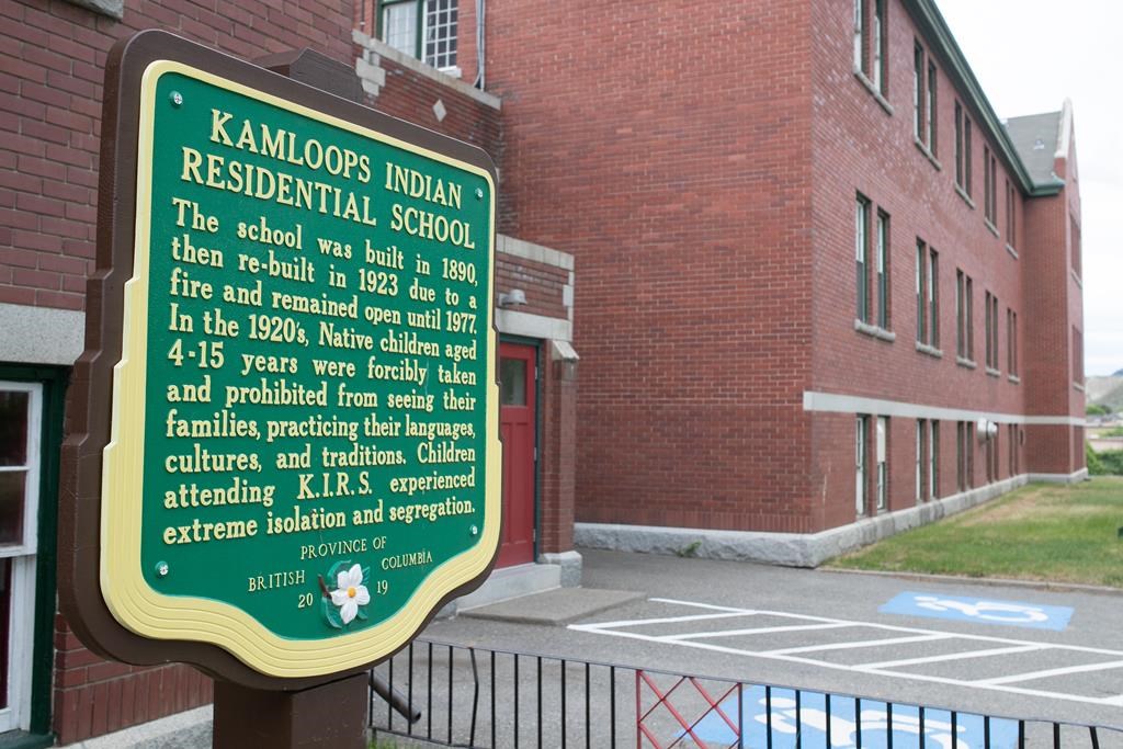 A plaque is seen outside of the former Kamloops Indian Residential School on Tk’emlups te Secwépemc First Nation in Kamloops, B.C. on Thursday, May 27, 2023. 