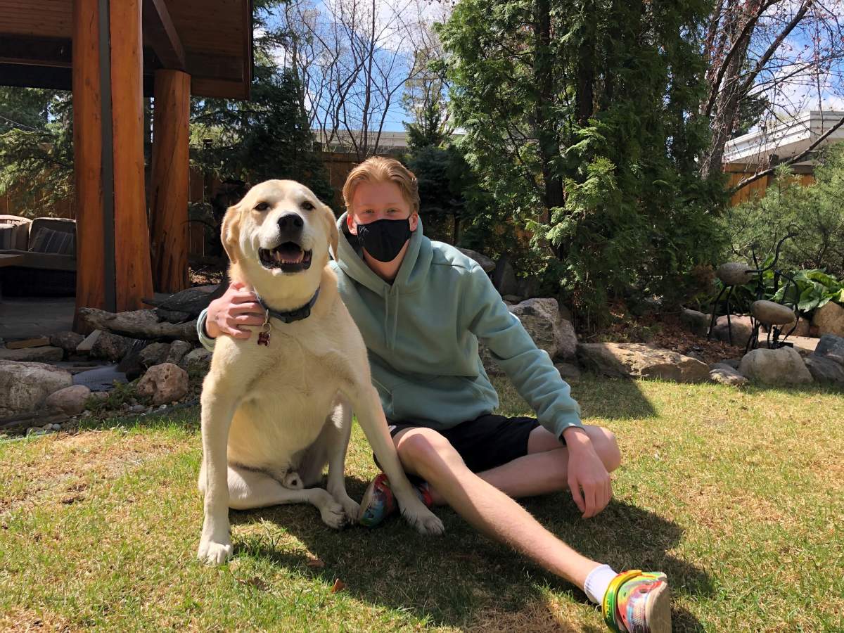 Aidan Markland in the backyard of his Edmonton home.