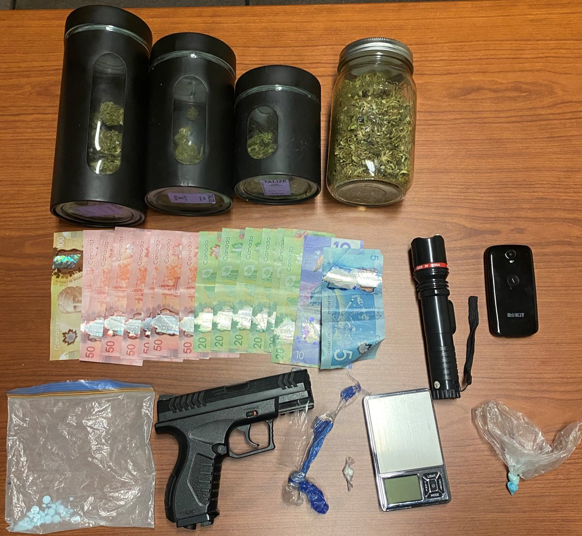 Drugs and weapons were seized in Peterborough during a traffic stop by OPP.
