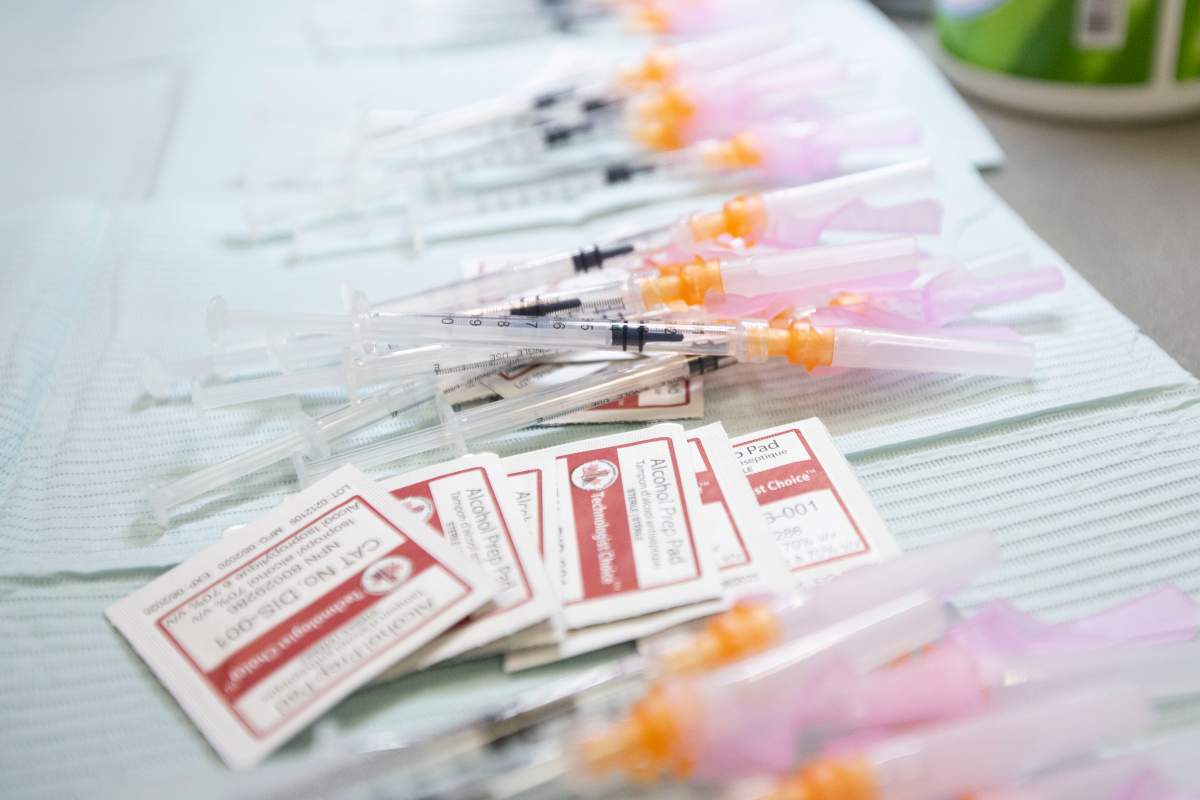 Syringes and disinfectant wipes that will be used at the COVID-19 vaccine clinic Strathcona Paper Centre in Napanee, Ontario, on Monday March 15, 2021. The centre will be used as a  immunization clinic for the Napanee area.THE CANADIAN PRESS/Lars Hagberg.
