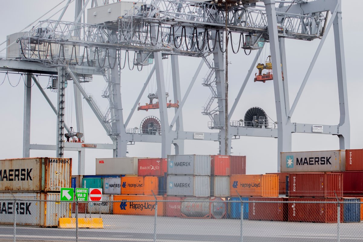 Shipping containers are shown at the Port of Montreal, Sunday, April 25, 2021. A general strike at the port is set to begin on Monday. 