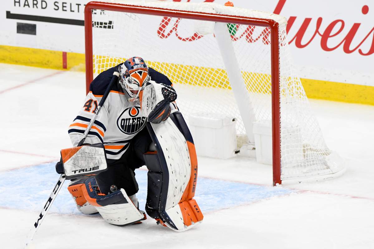 Edmonton Oilers goaltender Mike Smith (41) sits on the ice after allowing the game-winning goal during third overtime period NHL Stanley Cup playoff action against the Winnipeg Jets, in Winnipeg on Monday, May 24, 2021.