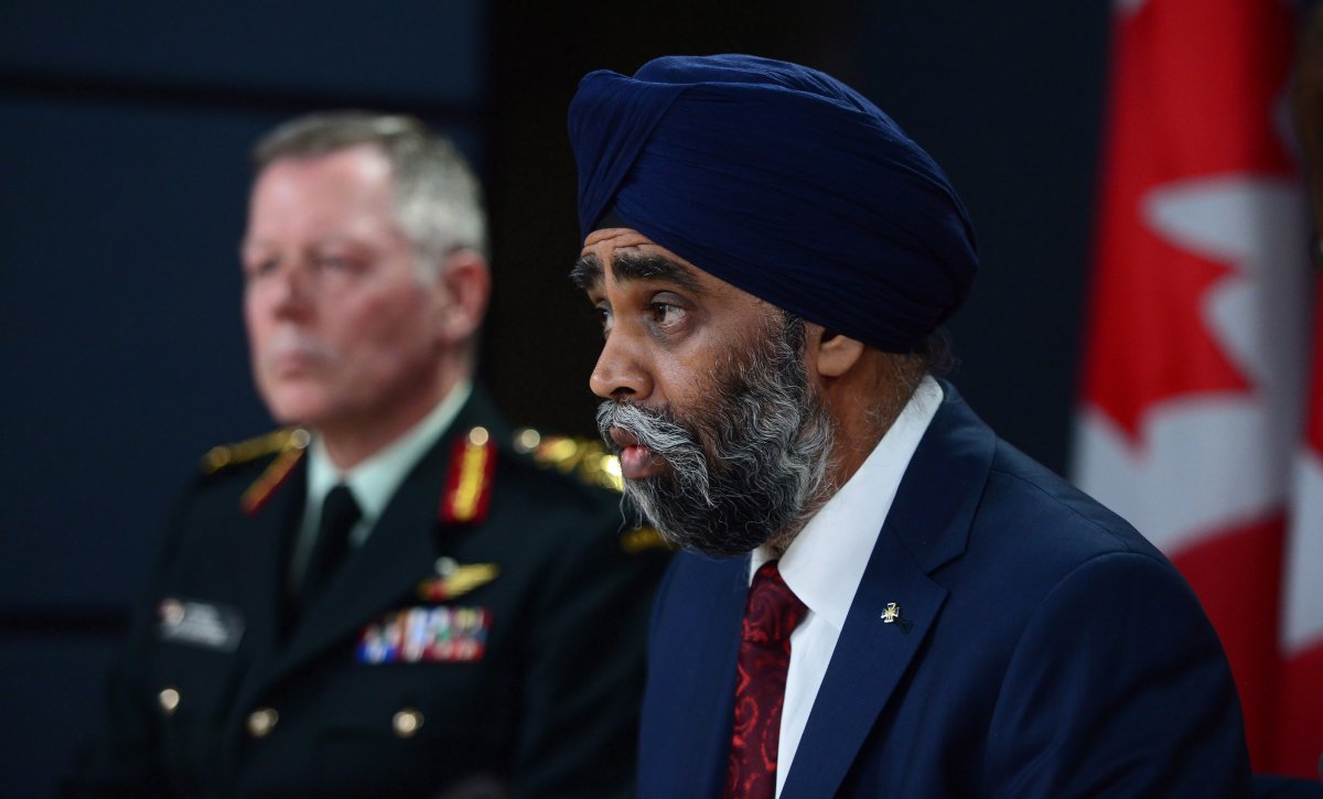 Defence Minister Harjit Sajjan (right) and Chief of Defence staff General Jonathan Vance attend a news conference on fighter jets in Ottawa on Tuesday, Nov. 22, 2016. THE CANADIAN PRESS/Sean Kilpatrick.