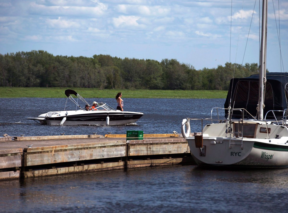 Boaters arrive at the marina in the Village of Gagetown, in southern New Brunswick, on Friday, June 12, 2015. the community is often described as a tranquil haven for those escaping the rush of city life. 