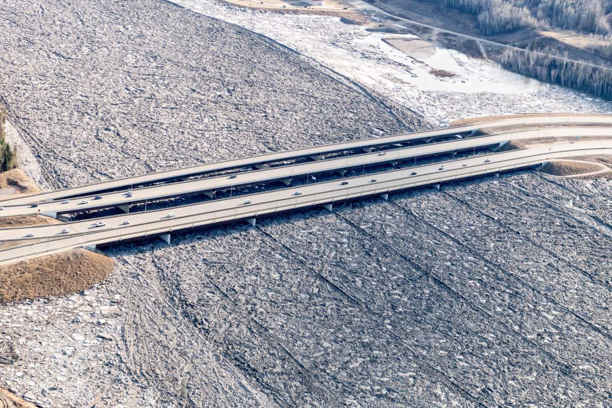 Striations in the ice jam caused by the piers of three bridges that cross the Athabasca River in Fort McMurray, Alberta is shown on Tuesday, April 28, 2020.