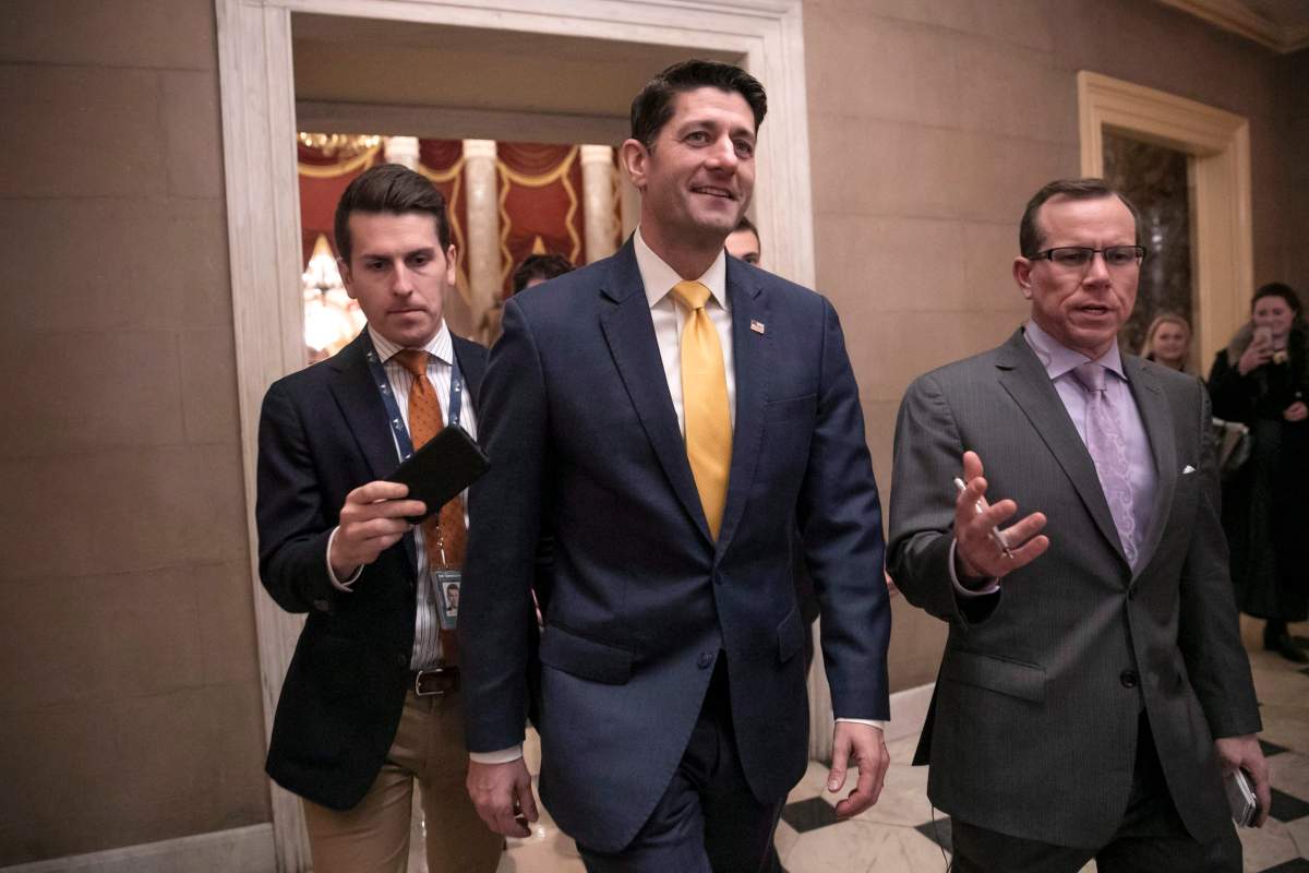 FILE - House Speaker Paul Ryan leaves the chamber after the Republican-led House approved funding for President Donald Trump's border wall in legislation that pushes the government closer to a partial government shutdown, at the Capitol in Washington, Thursday, Dec. 20, 2018.