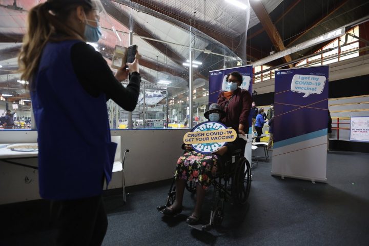 Selfies and photographs are a common theme at vaccine clinics