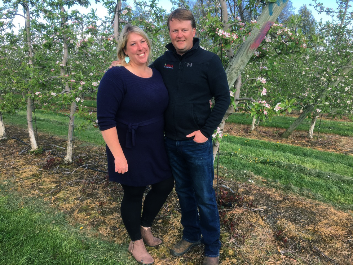 Amanda and Hayden Dooney, co-owners of Suncrest Orchards, in their apple orchards in Simcoe.