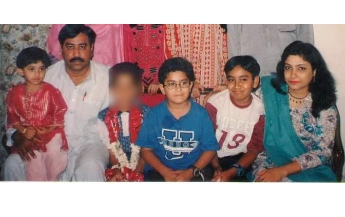 Haris Khan with his parents and siblings when he was younger.