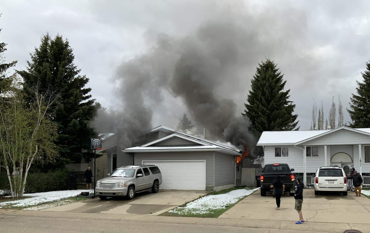 Multiple Daly Grove residents sprang into action, calling 911 and teaming up to help save a father and his children trapped in the basement of a home on 35 Street, near 18 Avenue on Wednesday, May 19, 2021.
