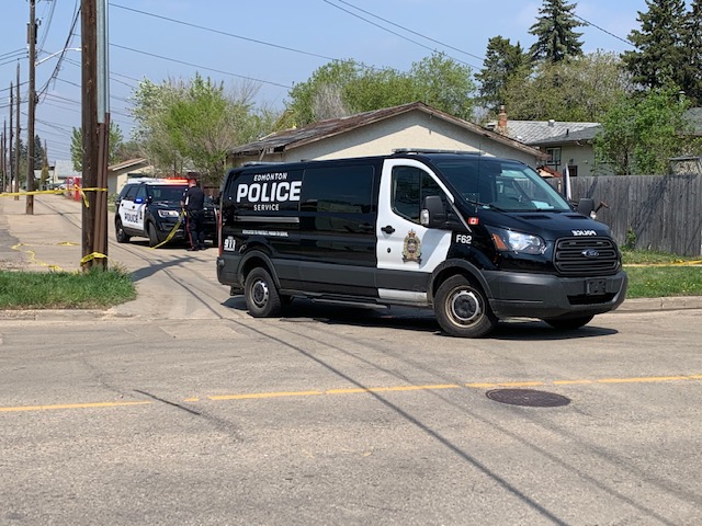 Edmonton police investigate a collision in the area of 126 Street and 129 Avenue on May 21, 2021.