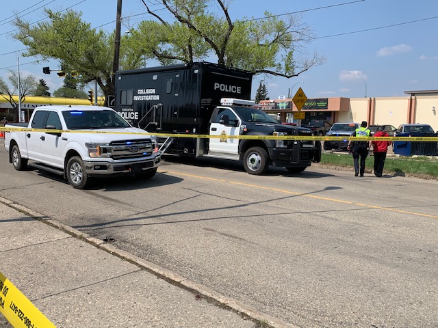 Edmonton police investigate a collision in the area of 126 Street and 129 Avenue on May 21, 2021.