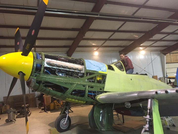 Putz gets behind the scenes of an aircraft while filming a feature for Focus Saskatchewan.