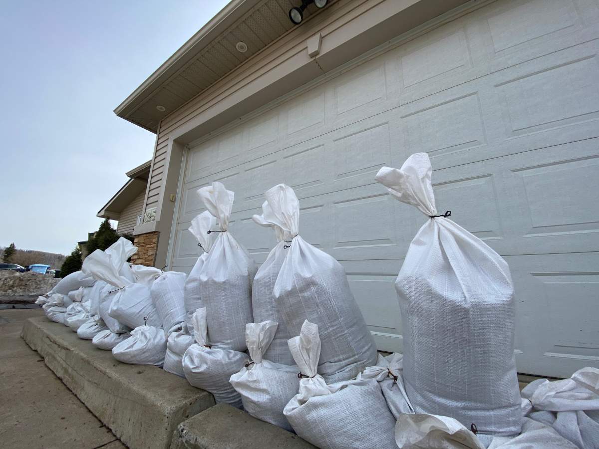 Sandbags outside Karl Behrisch’s house in Fort McMurray, Alta. in April 2021.