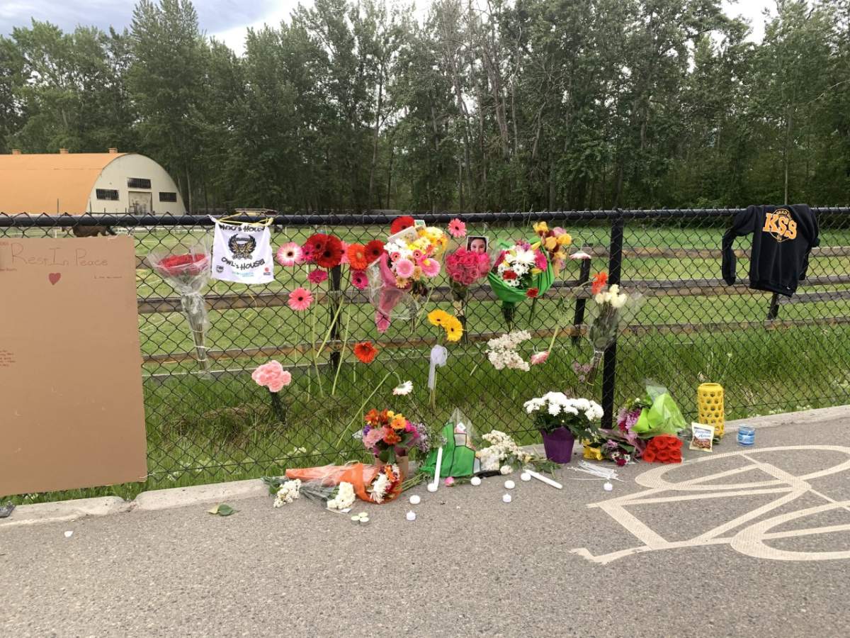 A makeshift memorial has been created at the site of a fatal crash in Kelowna early Wednesday that killed three local Grade 12 students.