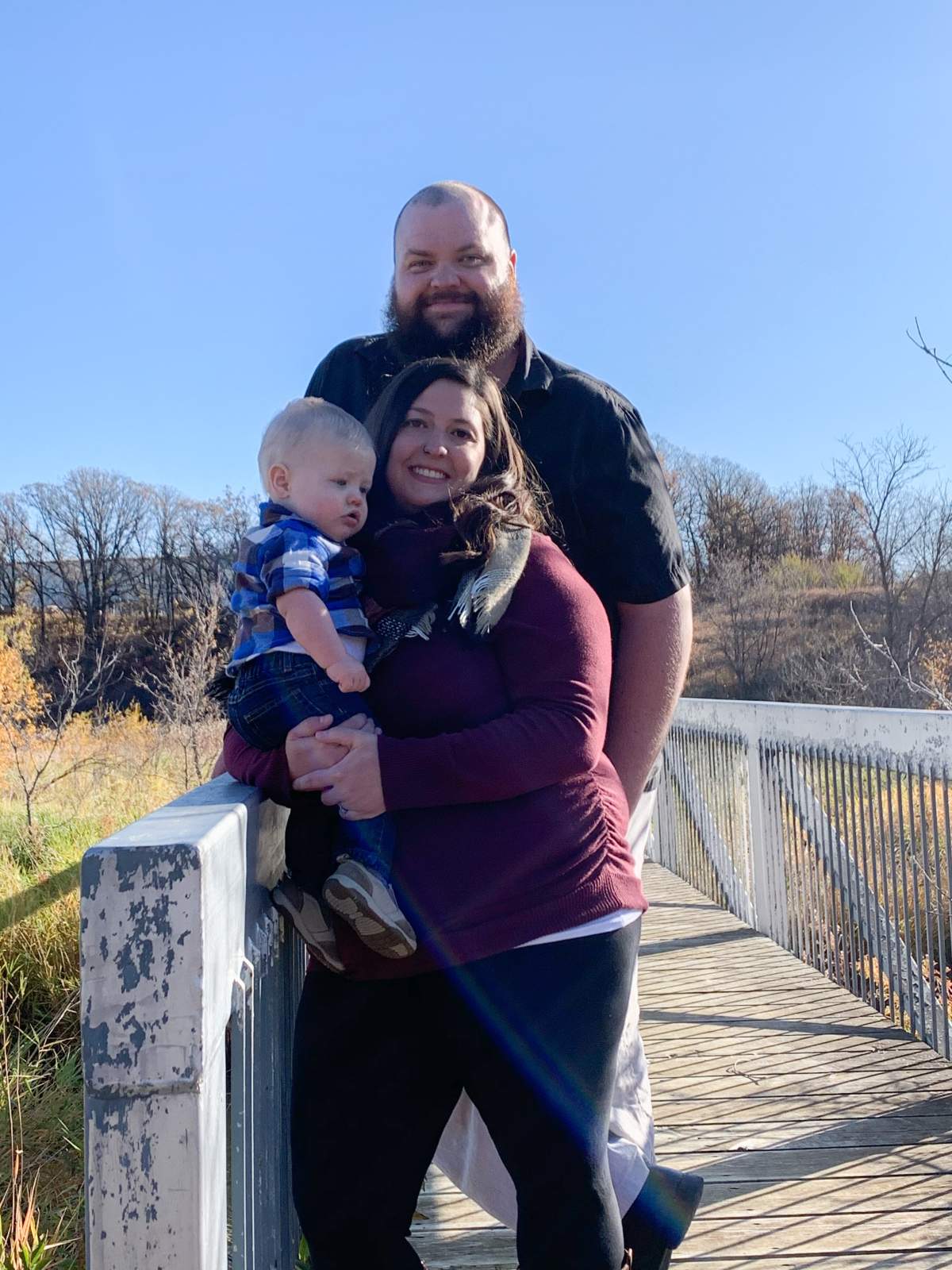 Kris Isford is pictured with his wife and son. All three contracted COVID-19.