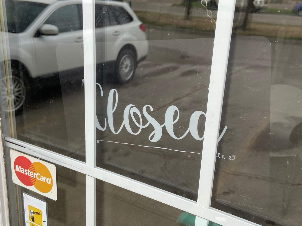 An Edmonton doctor is facing two charges and has withdrawn from practicing after the Alberta government said it was billed for fraudulent fees.