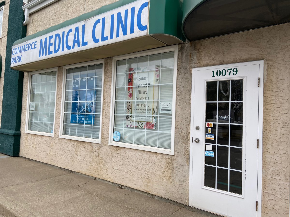 An Edmonton doctor is facing two charges and has withdrawn from practicing after the Alberta government said it was billed for fraudulent fees. 