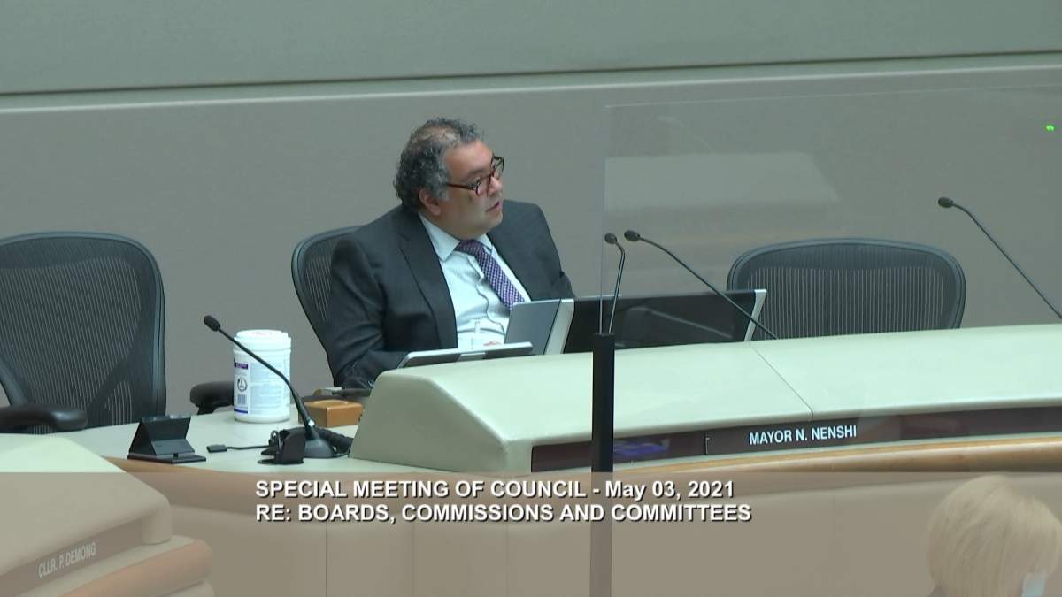 Calgary Mayor Naheed Nenshi sits in council chambers on May 3, 2021.