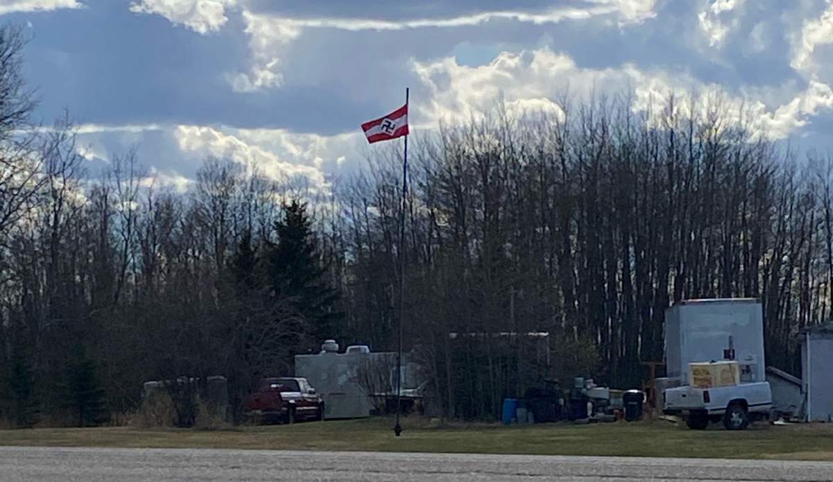 A Nazi Hitler Youth flag flying on a property near Boyle, Alta. in May 2021.