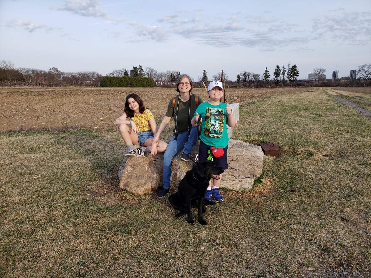 Oliver ‘Ollie’ Acosta-Pickering needed a stem cell transplant to survive cancer. COVID-19 put that in jeopardy. His older sister, Abby, who was a half-match was able to donate to save Ollie. From left, Abby Acosta-Pickering, Dawn Pickering, Oliver ‘Ollie’ Acosta-Pickering and hope the dog.