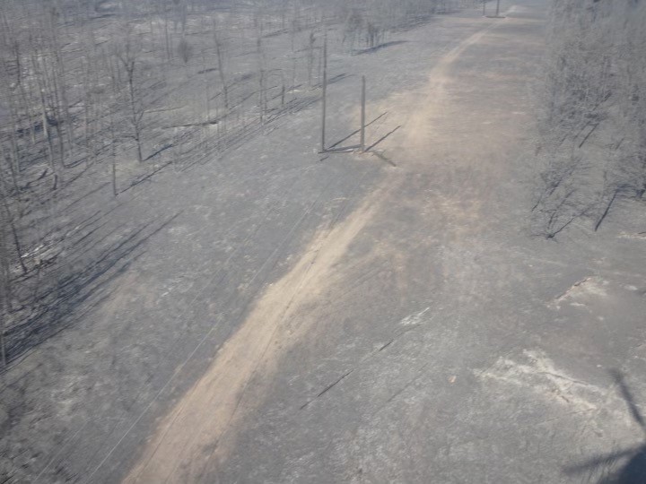Damage to SaskPower poles caused by the Cloverdale wildfire near Prince Albert, Sask.