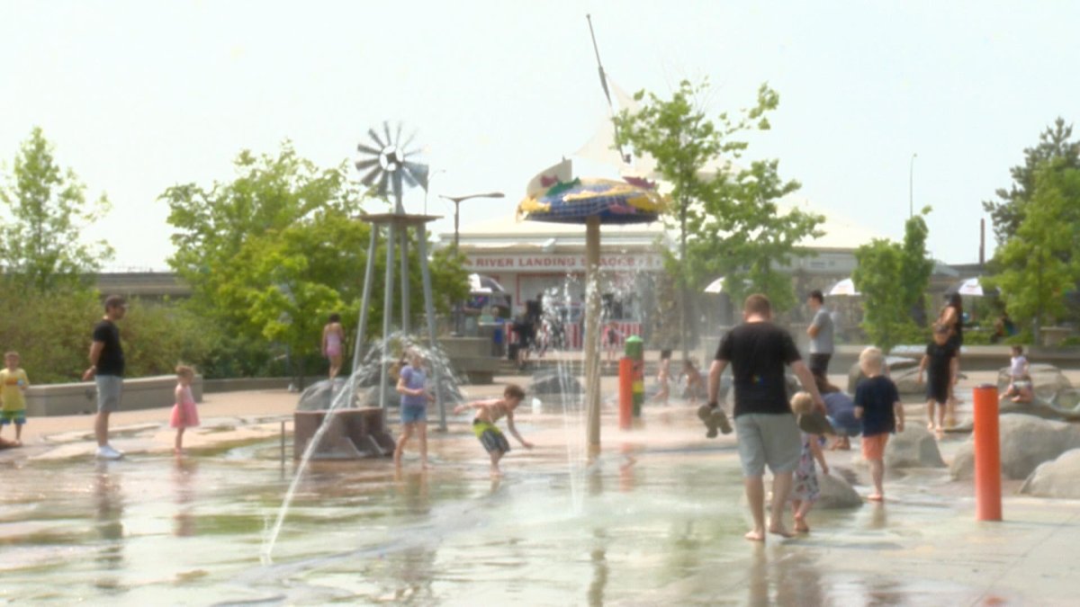 Saskatoon residents enjoying the spray pads during the heat.