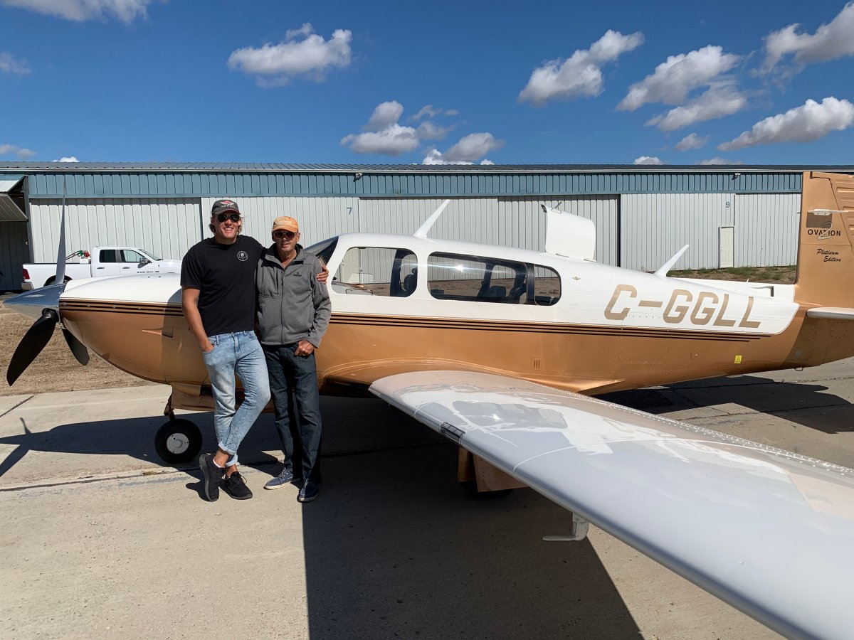 Trevor Jones, left, is the organizer of Sunday's flyover. His dad Blair Jones, right, is also taking part and will be flying a high performance aircraft. 