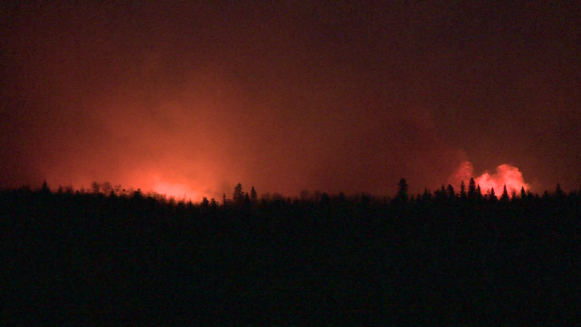 A wildfire that flared up Thursday near the hamlet of Tomahawk, south of Wabamun Lake in Parkland County, continued to burn overnight in the rural area west of Edmonton. May 6, 2021. 